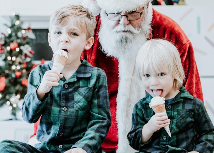 Kids with santa enjoying their ice creams for a local photo shoot